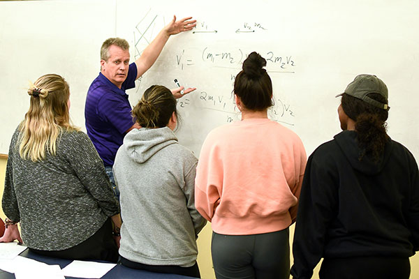 Students learning at a math seminar