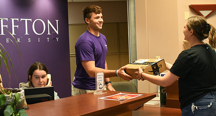 Student workers at Marbeck Desk