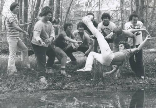 
An engaged male student is thrown into the Lagoon by fellow classmates in one of Bluffton's traditions.