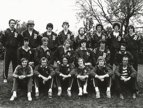 
The 1976 men's track team. First Row: Coach Bob Hilty, D. Ashcraft, J. Burt, C. Diller, A. Rodd, Coach L. Copeland. Second Row: K. Yoder, T. Smith, R. Cushion, D. Young, J. Michael, P. Cain. Third Row: S. Smith, J. Littleton, J. Semenik, J. Bremer, M. Cummins, M. Benroth, M. Hartman, K. Michaels.