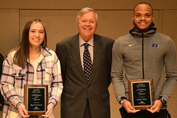 Brooke Kleman, Coach Dan Hughes and Jameel Cosby