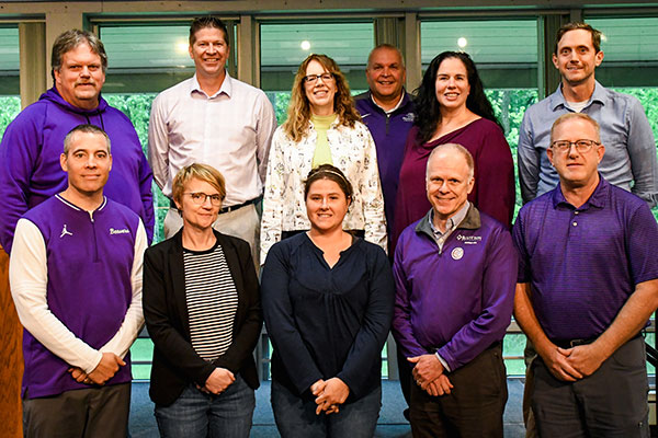 Employment milestones reached by (front row) Chad Shutler, Marathana Prothrow, Jessica Pratt, Mark Bourassa, John Burkhart. (back row) Bill Hanefeld, Steve Yarnell, Cindy Bandish, Phill Talavinia, Kate Spike and Luke Myers.
