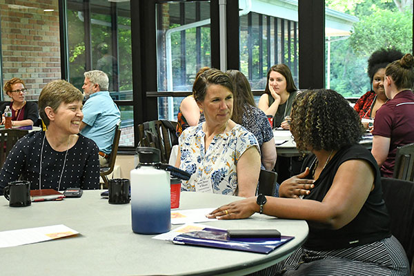 Collegiate faculty and staff from as far away as Rhodes Island, South Carolina and Winnipeg, Canada, gathered to discuss vocation.