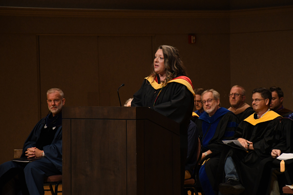 Bowsher opened with words of gratitude before inviting the audience into a moment of pause and breathe. “This is our evidence of being alive,” she said, before extending a message of congratulations, “You made it.”