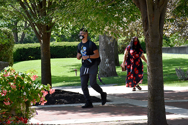 Students walk to Marbeck Center