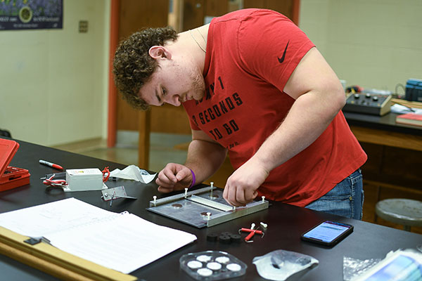 JT Taviano in the physics/engineering lab